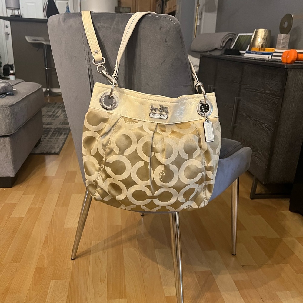 Coach champagne colored Crossbody